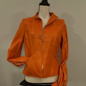 Illia genuine leather jacket, size 8, color orange.